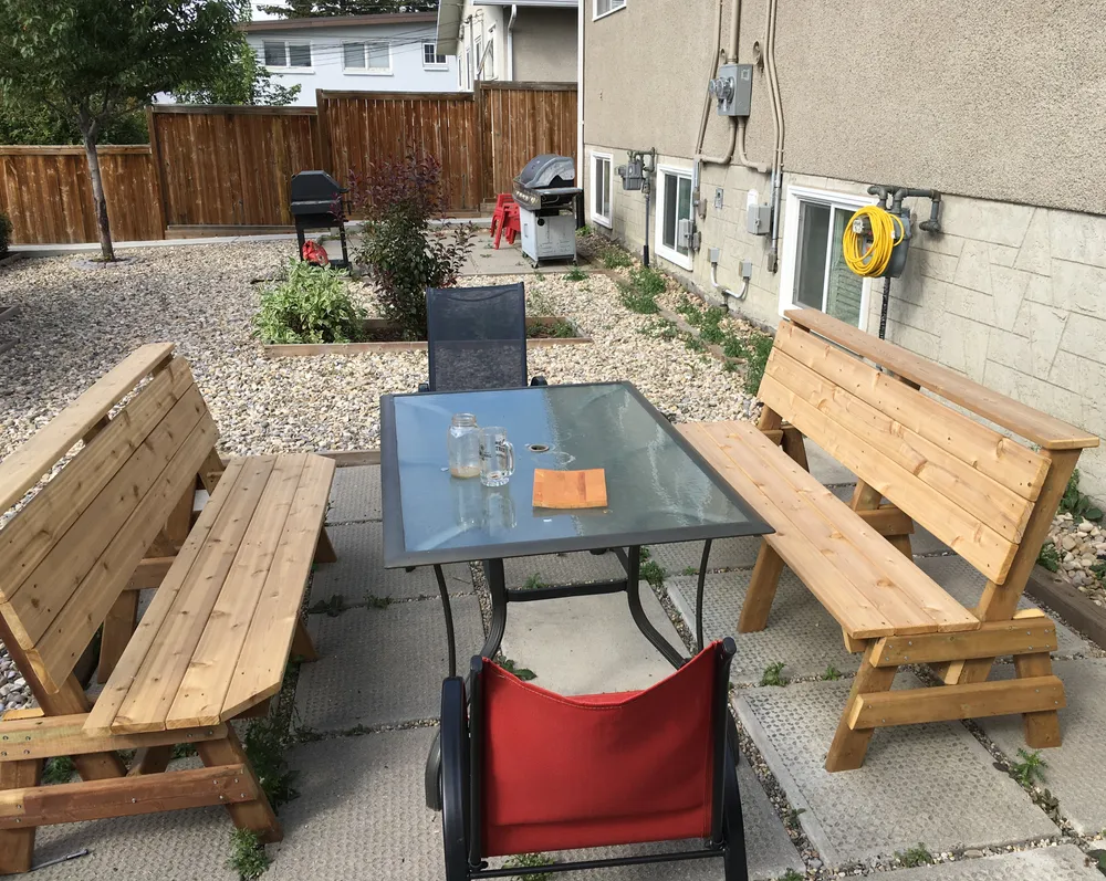 Photo of a pair of cedar benches